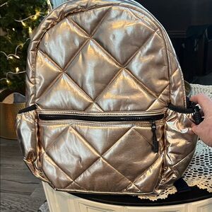 Elegant Metallic Quilted Backpack